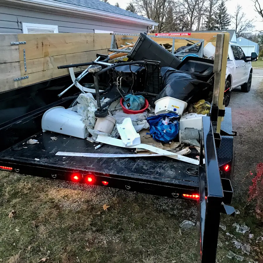 Roll-off dumpster delivered to a residential driveway in Elma