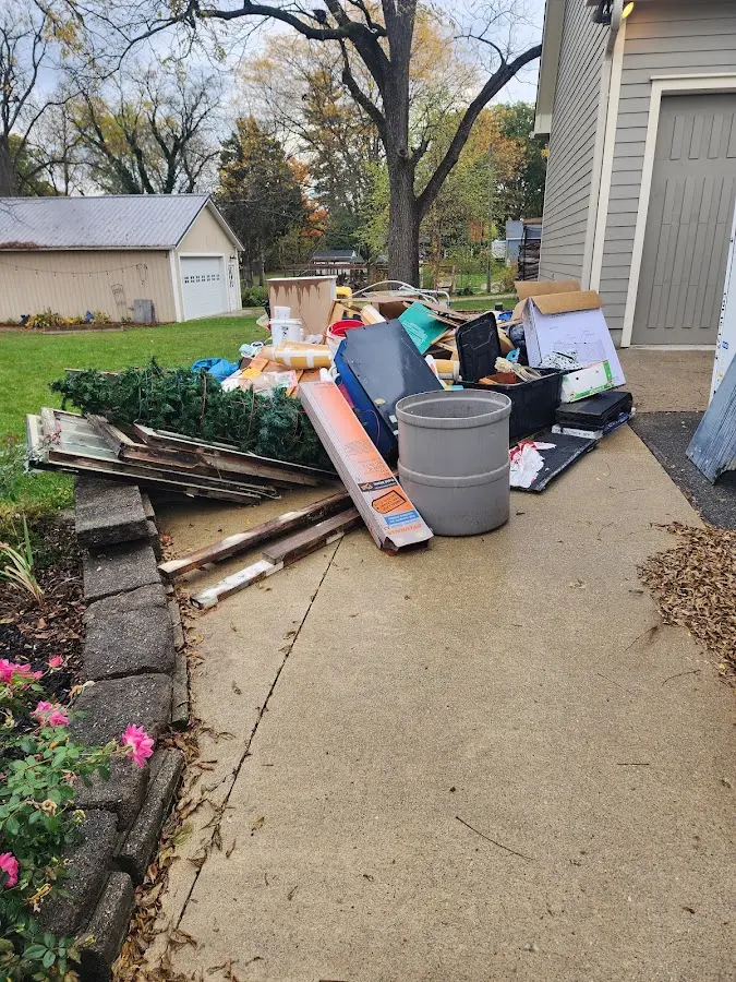 Dumpster being loaded with debris for Residential Dumpster Rental in Elma